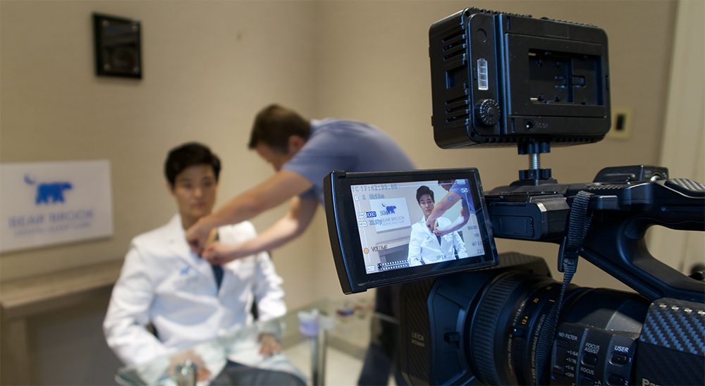 Dr. Lee Preparing to Film Video Content